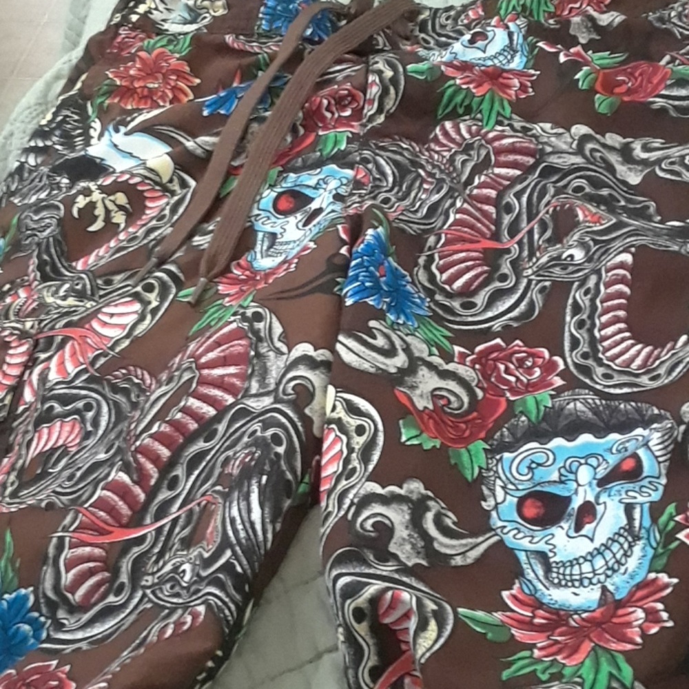 Surfaces size 8 skull long swim trunks